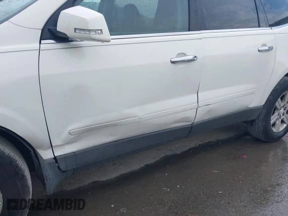 2012 Chevrolet Traverse 1LT with VIN 1GNKRGED9CJ283412, listed as a IAAI auction lot 42828479 with 189,000 mi miles and . Bid and sale history available at DreamBid. Image 6.