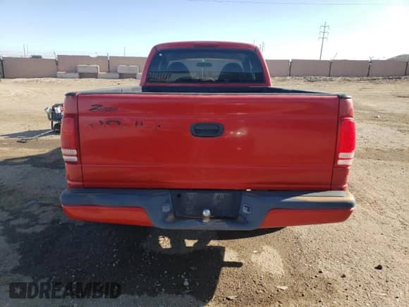 1998 Dodge Dakota SLT z VIN 1B7GL22X4WS693521, wystawiony jako Copart lot #61250105 z przebiegiem 97 534 mil mil oraz Szkoda całkowita • Salvage title. Historia ofert i sprzedaży dostępna na DreamBid. Obrazek 6.