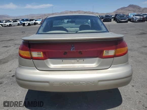 1997 Saturn SC с VIN 1G8ZG1277VZ308296, выставлен на аукционе Copart как лот 59011285 с пробегом 250 576 миль миль и Списание • Salvage title. История ставок и продаж доступна на DreamBid. Изображение 6.
