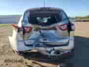 2016 Chevrolet Traverse LT with VIN 1GNKVHKD7GJ277457, listed as a Copart auction lot 84383965 with 125,508 mi miles and Salvage title. Bid and sale history available at DreamBid. Image 6.