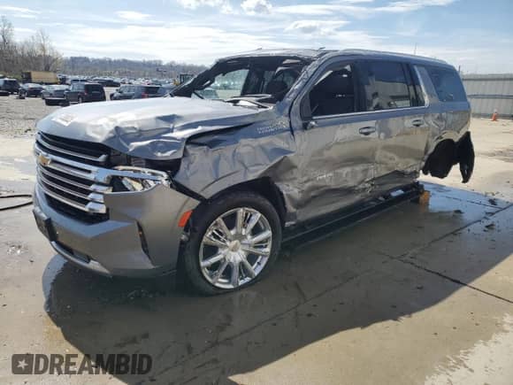 2022 Chevrolet Suburban High Country with VIN 1GNSKGKLXNR212370, listed as a Copart auction lot 50708835 with 114,646 mi miles and Salvage title. Bid and sale history available at DreamBid. Image 1.