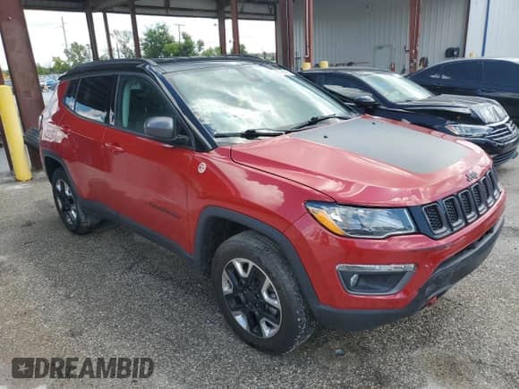 2017 Jeep Compass Trailhawk with VIN 3C4NJDDB9HT674796, listed as a Copart auction lot 80738795 with 58,865 mi miles and Salvage title. Bid and sale history available at DreamBid. Image 4.