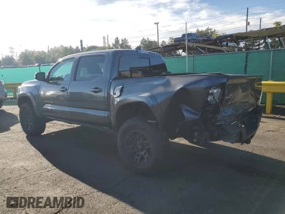 2023 Toyota Tacoma SR with VIN 3TMCZ5ANXPM559511, listed as a Copart auction lot 80508385 with 33,176 mi miles and Salvage title. Bid and sale history available at DreamBid. Image 2.