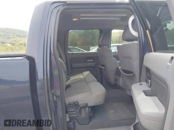 2004 Ford F-150 XLT with VIN 1FTRW14W34KB75458, listed as a IAAI auction lot 43350253 with 192,764 mi miles and . Bid and sale history available at DreamBid. Image 8.