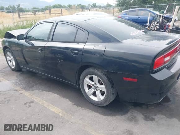 2012 Dodge Charger SE with VIN 2C3CDXBG2CH137983, listed as a IAAI auction lot 42769041 with 128,239 mi miles and . Bid and sale history available at DreamBid. Image 3.