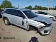 2023 Jeep Grand Cherokee Laredo with VIN 1C4RJHAG0P8710302, listed as a Copart auction lot 70679365 with 67,832 mi miles and Salvage title. Bid and sale history available at DreamBid. Image 4.