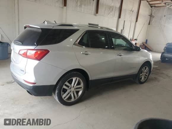 2018 Chevrolet Equinox Premier z VIN 3GNAXNEX1JS506327, wystawiony jako Copart lot #82082895 z przebiegiem 87 027 mil mil oraz Szkoda całkowita • Salvage title. Historia ofert i sprzedaży dostępna na DreamBid. Obrazek 3.