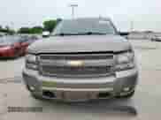 2011 Chevrolet Suburban LT with VIN 1GNSCJE05BR400575, listed as a Copart auction lot 56746125 with 222,482 mi miles and Salvage title. Bid and sale history available at DreamBid. Image 5.