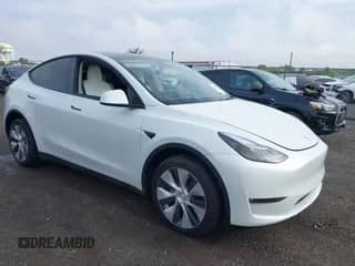 2023 Tesla Model Y Long Range with VIN 7SAYGDEE5PF633389, listed as a IAAI auction lot 42969850 with 16,889 mi miles and . Bid and sale history available at DreamBid. Image 1.