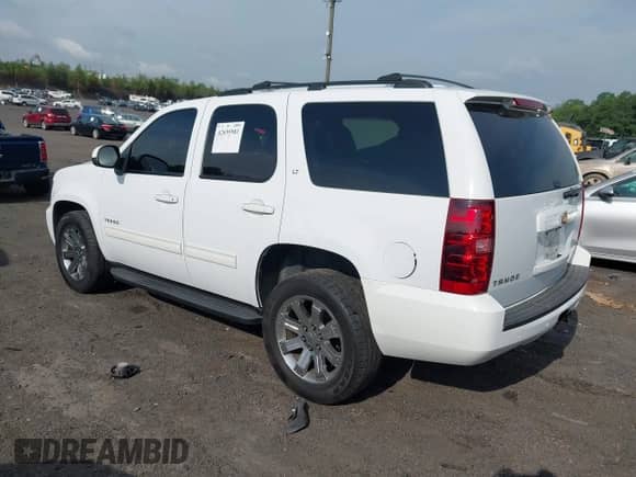 2011 Chevrolet Tahoe LT with VIN 1GNSKBE05BR135228, listed as a IAAI auction lot 42695981 with 106,281 mi miles and . Bid and sale history available at DreamBid. Image 3.