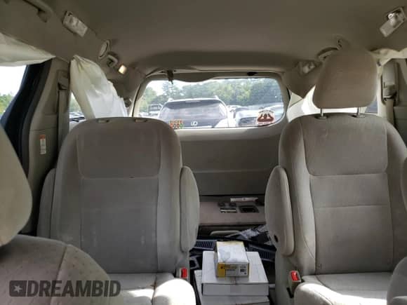 2015 Toyota Sienna LE z VIN 5TDJK3DC5FS117535, wystawiony jako Copart lot #81283925 z przebiegiem 135 333 mil mil oraz Czysty tytuł • Clean title. Historia ofert i sprzedaży dostępna na DreamBid. Obrazek 10.