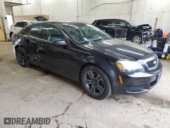 2012 Chevrolet Caprice Police Police with VIN 6G1MK5U21CL660129, listed as a Copart auction lot 79311404 with 164,734 mi miles and Salvage title. Bid and sale history available at DreamBid. Image 4.