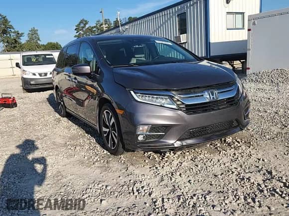 2019 Honda Odyssey Elite с VIN 5FNRL6H91KB024719, выставлен на аукционе Copart как лот 72040265 с пробегом 99 803 миль миль и Списание • Salvage title. История ставок и продаж доступна на DreamBid. Изображение 14.