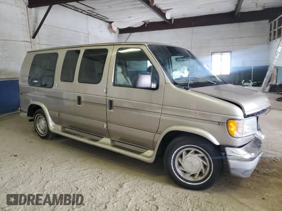 2002 Ford Econoline Cargo Recreational with VIN 1FDRE14W32HB64467, listed as a Copart auction lot 81878595 with 139,517 mi miles and Salvage title. Bid and sale history available at DreamBid. Image 4.