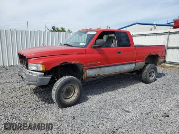 2000 Dodge 2500 with VIN 1B7KF23Z6YJ187490, listed as a Copart auction lot 57873375 with 238,769 mi miles and Salvage title. Bid and sale history available at DreamBid. Image 1.
