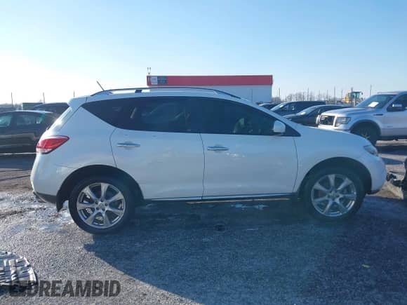 2014 Nissan Murano SL z VIN JN8AZ1MU6EW406712, wystawiony jako IAAI lot #41248115 z przebiegiem 226 578 mil mil oraz . Historia ofert i sprzedaży dostępna na DreamBid. Obrazek 13.