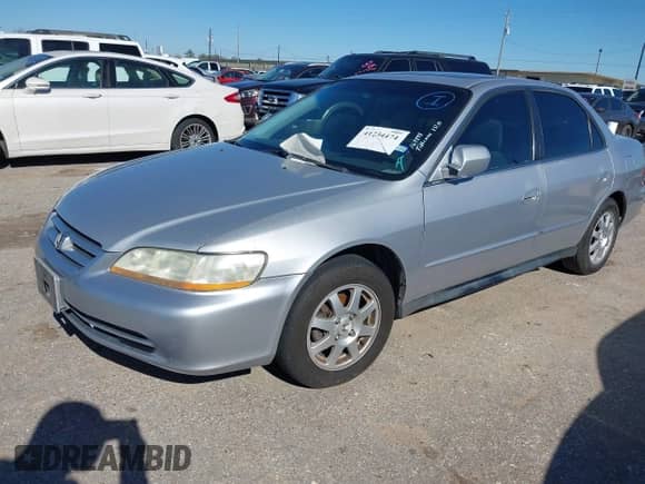 2002 Honda Accord SE with VIN 1HGCG56722A169896, listed as a IAAI auction lot 41234474 with 171,829 mi miles and . Bid and sale history available at DreamBid. Image 2.