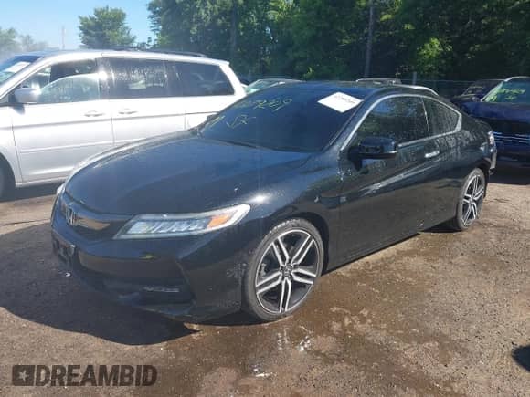 2017 Honda Accord Touring with VIN 1HGCT2B09HA004245, listed as a IAAI auction lot 42289209 with 56,670 mi miles and . Bid and sale history available at DreamBid. Image 2.