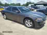 2014 Dodge Charger SE with VIN 2C3CDXBG1EH331701, listed as a Copart auction lot 61850095 with 134,108 mi miles and Salvage title. Bid and sale history available at DreamBid. Image 4.