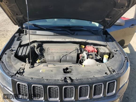 2019 Jeep Compass Trailhawk with VIN 3C4NJDDB2KT713400, listed as a Copart auction lot 84782185 with 63,337 mi miles and Salvage title. Bid and sale history available at DreamBid. Image 12.