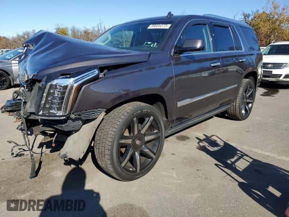 2015 Cadillac Escalade Premium with VIN 1GYS4CKJ0FR220399, listed as a Copart auction lot 89659375 with 105,848 mi miles and Salvage title. Bid and sale history available at DreamBid. Image 1.