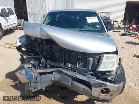 2008 Nissan Frontier SE z VIN 1N6AD07U88C411817, wystawiony jako IAAI lot #42862723 z przebiegiem 179 595 mil mil oraz . Historia ofert i sprzedaży dostępna na DreamBid. Obrazek 13.