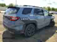 2023 Honda Pilot Elite with VIN 5FNYG1H82PB034130, listed as a Copart auction lot 56763214 with 7,710 mi miles and Salvage title. Bid and sale history available at DreamBid. Image 3.