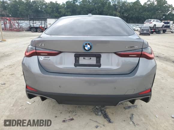 2023 BMW i4 eDrive35 with VIN WBY43AW0XPFP98552, listed as a Copart auction lot 63310845 with 13,769 mi miles and Salvage title. Bid and sale history available at DreamBid. Image 6.