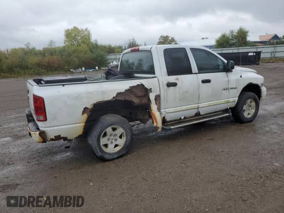 2005 Dodge 1500 SLT z VIN 1D7HU18D15S268383, wystawiony jako Copart lot #72620554 z przebiegiem 129 365 mil mil oraz Czysty tytuł • Clean title. Historia ofert i sprzedaży dostępna na DreamBid. Obrazek 3.