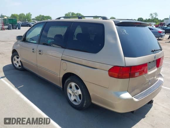 2000 Honda Odyssey EX with VIN 2HKRL1868YH001859, listed as a IAAI auction lot 42165724 with 209,393 mi miles and . Bid and sale history available at DreamBid. Image 3.