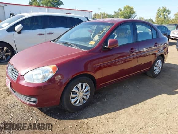 2011 Hyundai Accent GLS z VIN KMHCN4AC0BU574054, wystawiony jako IAAI lot #43186432 z przebiegiem 205 376 mil mil oraz . Historia ofert i sprzedaży dostępna na DreamBid. Obrazek 2.