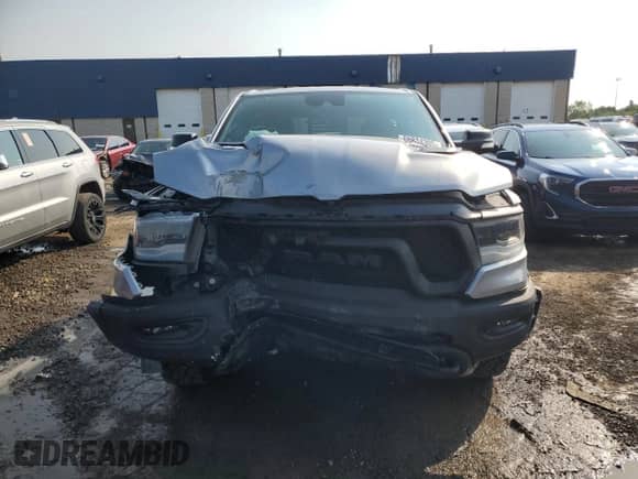 2022 Ram 1500 Rebel z VIN 1C6SRFLM8NN308373, wystawiony jako Copart lot #66814305 z przebiegiem 66 857 mil mil oraz Czysty tytuł • Clean title. Historia ofert i sprzedaży dostępna na DreamBid. Obrazek 5.