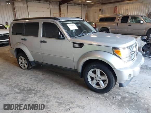 2007 Dodge Nitro SXT with VIN 1D8GU28K17W731307, listed as a IAAI auction lot 43160059 with 168,275 mi miles and . Bid and sale history available at DreamBid. Image 1.
