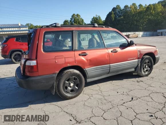 2001 Subaru Forester L with VIN JF1SF63591H708242, listed as a Copart auction lot 70666585 with 189,497 mi miles and Salvage title. Bid and sale history available at DreamBid. Image 3.
