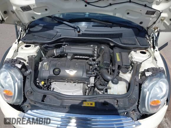 2012 MINI Hardtop with VIN WMWSU3C50CT255544, listed as a IAAI auction lot 42533243 with 102,422 mi miles and . Bid and sale history available at DreamBid. Image 10.