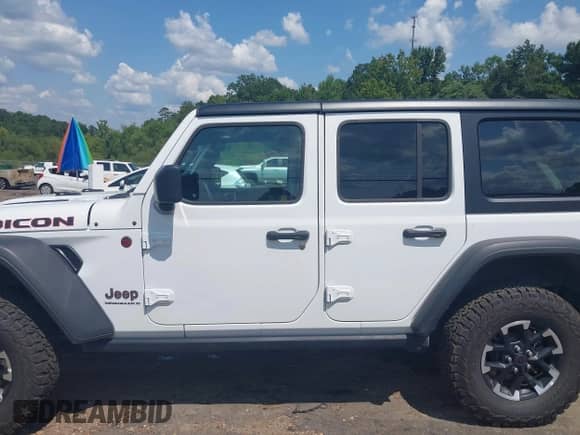 2025 Jeep Wrangler Rubicon with VIN 1C4PJXFN7SW525466, listed as a IAAI auction lot 42950213 with 10,695 mi miles and . Bid and sale history available at DreamBid. Image 14.