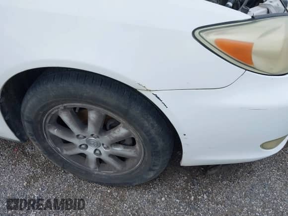2004 Toyota Camry LE with VIN 4T1BE30KX4U308459, listed as a IAAI auction lot 43001779 with 237,783 mi miles and . Bid and sale history available at DreamBid. Image 13.