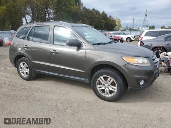 2012 Hyundai Santa Fe GLS с VIN 5XYZG4AGXCG137094, выставлен на аукционе Copart как лот 85352065 с пробегом 362 654 миль миль и Чистый • Clean title. История ставок и продаж доступна на DreamBid. Изображение 4.