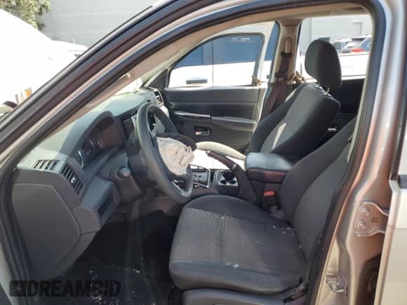 2009 Jeep Grand Cherokee Laredo with VIN 1J8GS48K29C503538, listed as a Copart auction lot 61381754 with 135,759 mi miles and Salvage title. Bid and sale history available at DreamBid. Image 7.