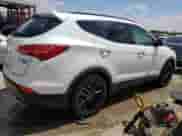 2015 Hyundai Santa Fe с VIN 5XYZW4LA4FG238521, выставлен на аукционе Copart как лот 56518735 с пробегом 175 454 миль миль и Списание • Salvage title. История ставок и продаж доступна на DreamBid. Изображение 3.