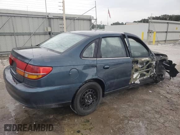 2002 Saturn LS with VIN 1G8JU54F72Y581967, listed as a Copart auction lot 74521994 with 215,018 mi miles and Salvage title. Bid and sale history available at DreamBid. Image 3.