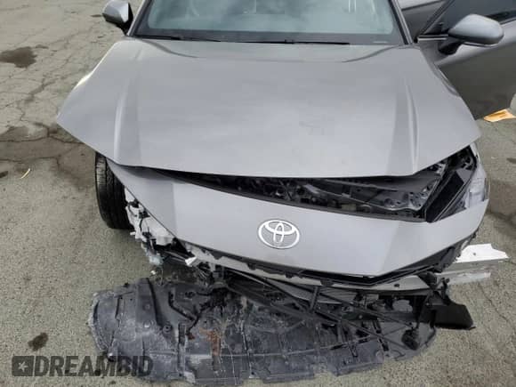 2025 Toyota Camry LE with VIN 4T1DAACKXSU620198, listed as a Copart auction lot 83829035 with 1,218 mi miles and Salvage title. Bid and sale history available at DreamBid. Image 11.