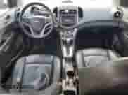 2014 Chevrolet Sonic LTZ с VIN 1G1JE6SB4E4178266, выставлен на аукционе Copart как лот 57064715 с пробегом 182 850 миль миль и Чистый • Clean title. История ставок и продаж доступна на DreamBid. Изображение 8.
