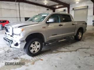2011 Toyota Tundra with VIN 5TFDW5F12BX174207, listed as a Copart auction lot 69617305 with 144,177 mi miles and Salvage title. Bid and sale history available at DreamBid. Image 1.
