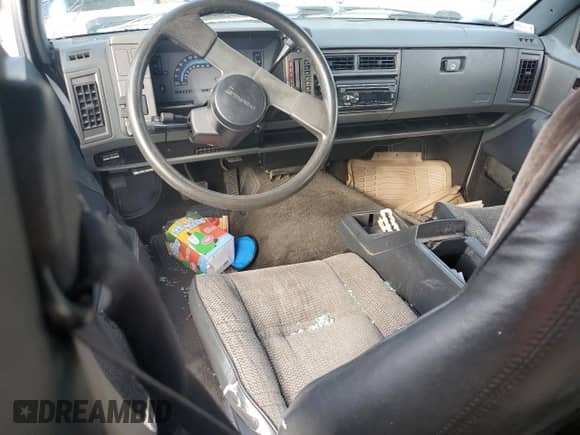 1990 Chevrolet Blazer with VIN 1GNCS18ZXL8120949, listed as a Copart auction lot 81850765 with 129,436 mi miles and Salvage title. Bid and sale history available at DreamBid. Image 8.