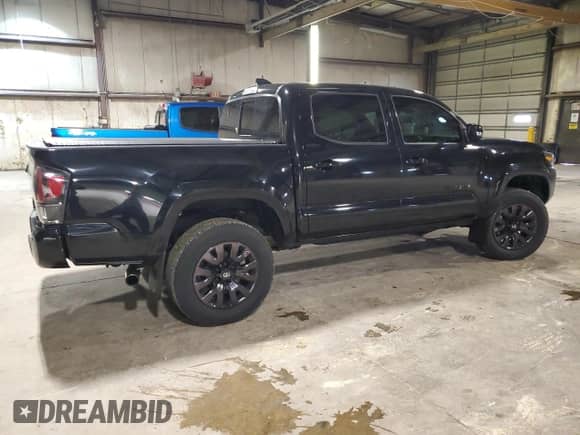 2021 Toyota Tacoma Limited with VIN 3TMGZ5ANXMM430133, listed as a Copart auction lot 57884415 with 36,650 mi miles and Salvage title. Bid and sale history available at DreamBid. Image 3.