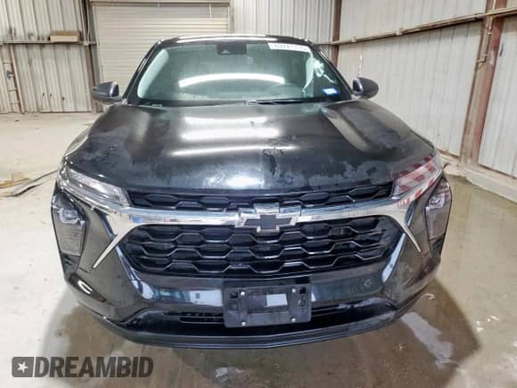 2024 Chevrolet Trax LS z VIN KL77LFE20RC014430, wystawiony jako Copart lot #69741155 z przebiegiem 36 830 mil mil oraz Czysty tytuł • Clean title. Historia ofert i sprzedaży dostępna na DreamBid. Obrazek 5.
