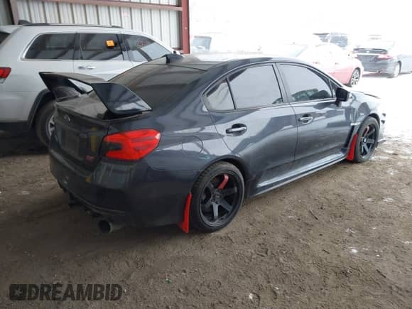 2017 Subaru WRX STI with VIN JF1VA2M63H9841112, listed as a IAAI auction lot 41554851 with 58,451 mi miles and . Bid and sale history available at DreamBid. Image 4.