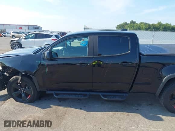 2018 Chevrolet Colorado 4WD LT z VIN 1GCGTCEN1J1324582, wystawiony jako IAAI lot #42919592 z przebiegiem 74 502 mil mil oraz . Historia ofert i sprzedaży dostępna na DreamBid. Obrazek 14.
