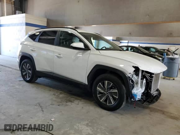 2024 Hyundai Tucson Blue with VIN KM8JBCD1XRU154834, listed as a Copart auction lot 71066995 with 13,974 mi miles and Salvage title. Bid and sale history available at DreamBid. Image 4.